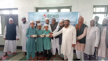 চাঁপাইনবাবগঞ্জে ইকোর সহায়তায় ৪০০ শিক্ষার্থীর মাঝে উন্নত মানের খাবার বিতরণ