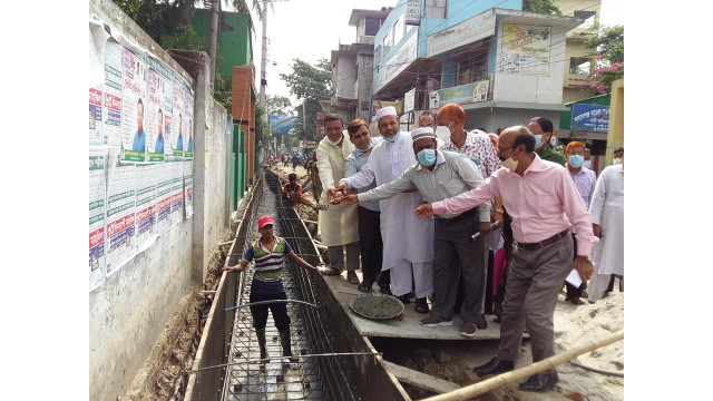 চাঁপাইনবাবগঞ্জ পৌরসভার সড়ক ও ড্রেন নির্মাণ কাজ উদ্বোধন