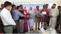 নাচোলে কৃষকের মাঝে প্রনোদনার বীজ-সার বিতরণ