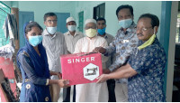 গোমস্তাপুরে জেলা পরিষদের অর্থ সহায়তায় সেলাই মেশিন ও ফ্যান বিতরণ